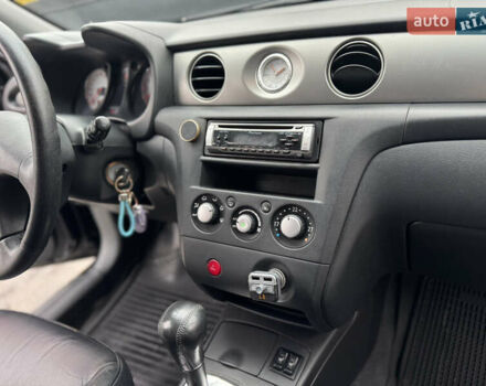 Черный Мицубиси Аутлендер, объемом двигателя 2.4 л и пробегом 242 тыс. км за 6800 $, фото 58 на Automoto.ua