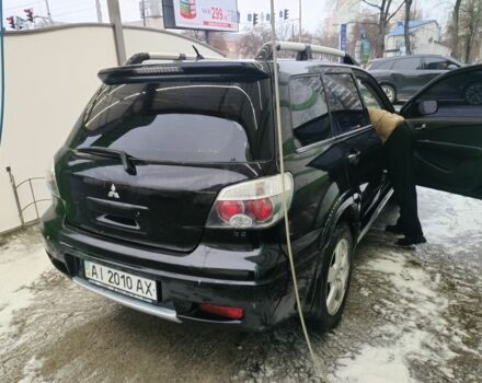 Чорний Міцубісі Аутлендер, об'ємом двигуна 2.4 л та пробігом 360 тис. км за 5200 $, фото 6 на Automoto.ua