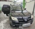 Чорний Міцубісі Аутлендер, об'ємом двигуна 2.4 л та пробігом 360 тис. км за 5200 $, фото 1 на Automoto.ua