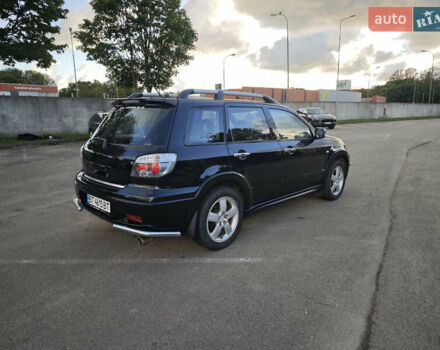 Чорний Міцубісі Аутлендер, об'ємом двигуна 2 л та пробігом 207 тис. км за 6900 $, фото 5 на Automoto.ua