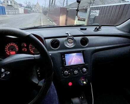 Черный Мицубиси Аутлендер, объемом двигателя 2.4 л и пробегом 234 тыс. км за 5499 $, фото 12 на Automoto.ua