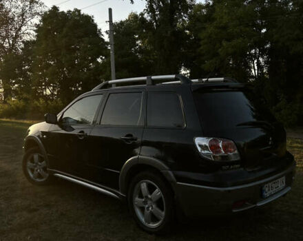 Мицубиси Аутлендер 2006 в Чернобае на Automoto.ua Черный Мицубиси Аутлендер, объемом двигателя 2.38 л и пробегом 278 тыс. км за 5300 $, фото 13 на Automoto.ua
