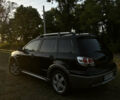 Мицубиси Аутлендер 2006 в Чернобае на Automoto.ua Черный Мицубиси Аутлендер, объемом двигателя 2.38 л и пробегом 278 тыс. км за 5300 $, фото 13 на Automoto.ua