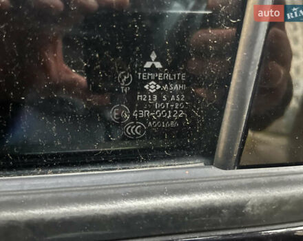 Чорний Міцубісі Аутлендер, об'ємом двигуна 2.38 л та пробігом 247 тис. км за 5499 $, фото 72 на Automoto.ua