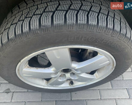 Черный Мицубиси Аутлендер, объемом двигателя 2 л и пробегом 212 тыс. км за 6000 $, фото 34 на Automoto.ua