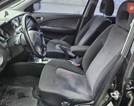 Черный Мицубиси Аутлендер, объемом двигателя 2.4 л и пробегом 167 тыс. км за 6150 $, фото 26 на Automoto.ua