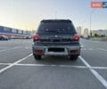 Черный Мицубиси Аутлендер, объемом двигателя 2 л и пробегом 158 тыс. км за 6700 $, фото 1 на Automoto.ua