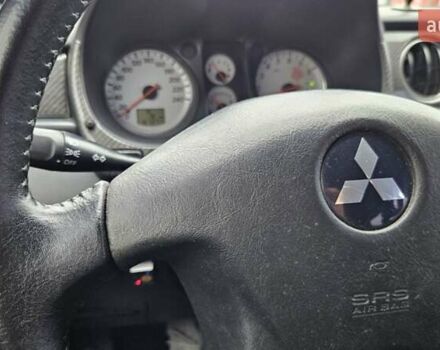 Черный Мицубиси Аутлендер, объемом двигателя 2.4 л и пробегом 167 тыс. км за 6150 $, фото 33 на Automoto.ua