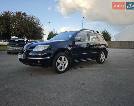 Чорний Міцубісі Аутлендер, об'ємом двигуна 2 л та пробігом 207 тис. км за 6900 $, фото 4 на Automoto.ua