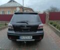 Черный Мицубиси Аутлендер, объемом двигателя 2 л и пробегом 200 тыс. км за 5100 $, фото 2 на Automoto.ua