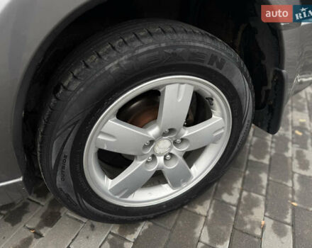 Черный Мицубиси Аутлендер, объемом двигателя 2.4 л и пробегом 242 тыс. км за 6800 $, фото 23 на Automoto.ua