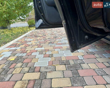 Чорний Міцубісі Аутлендер, об'ємом двигуна 2.38 л та пробігом 247 тис. км за 5499 $, фото 12 на Automoto.ua