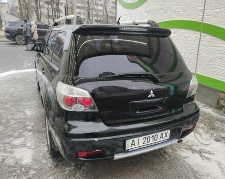 Чорний Міцубісі Аутлендер, об'ємом двигуна 2.4 л та пробігом 360 тис. км за 5200 $, фото 4 на Automoto.ua