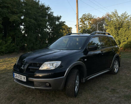 Мицубиси Аутлендер 2006 в Чернобае на Automoto.ua Черный Мицубиси Аутлендер, объемом двигателя 2.38 л и пробегом 278 тыс. км за 5300 $, фото 17 на Automoto.ua