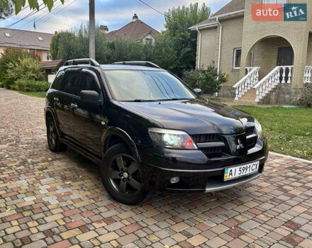 Чорний Міцубісі Аутлендер, об'ємом двигуна 2.38 л та пробігом 247 тис. км за 5499 $, фото 33 на Automoto.ua