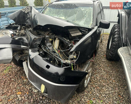 Черный Мицубиси Аутлендер, объемом двигателя 2.4 л и пробегом 240 тыс. км за 2200 $, фото 2 на Automoto.ua