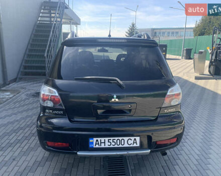 Черный Мицубиси Аутлендер, объемом двигателя 2 л и пробегом 212 тыс. км за 6000 $, фото 11 на Automoto.ua