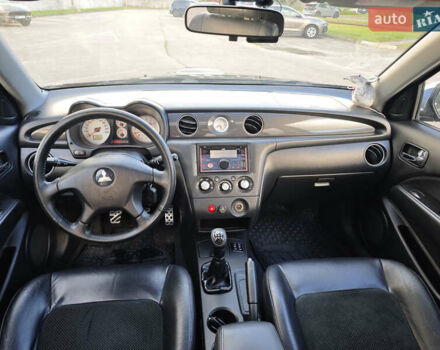 Чорний Міцубісі Аутлендер, об'ємом двигуна 2 л та пробігом 207 тис. км за 6900 $, фото 10 на Automoto.ua