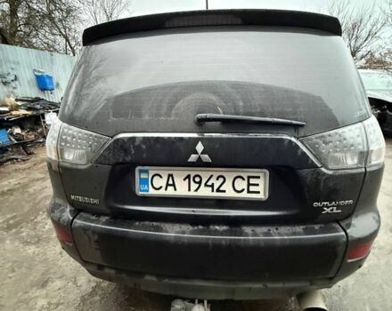 Чорний Міцубісі Аутлендер, об'ємом двигуна 2.4 л та пробігом 215 тис. км за 8300 $, фото 1 на Automoto.ua