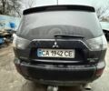 Чорний Міцубісі Аутлендер, об'ємом двигуна 2.4 л та пробігом 215 тис. км за 8300 $, фото 1 на Automoto.ua