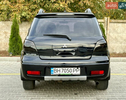 Міцубісі Аутлендер 2007 у Одесі на Automoto.ua Чорний Міцубісі Аутлендер, об'ємом двигуна 2.4 л та пробігом 201 тис. км за 7700 $, фото 10 на Automoto.ua
