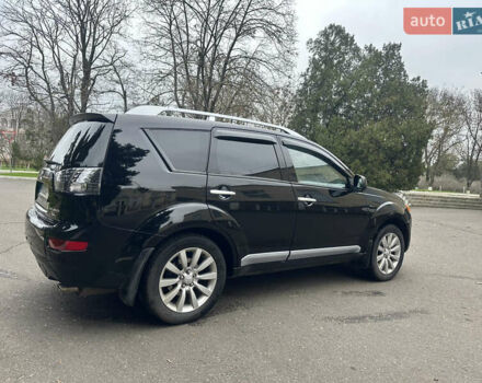 Чорний Міцубісі Аутлендер, об'ємом двигуна 2.4 л та пробігом 230 тис. км за 8300 $, фото 12 на Automoto.ua