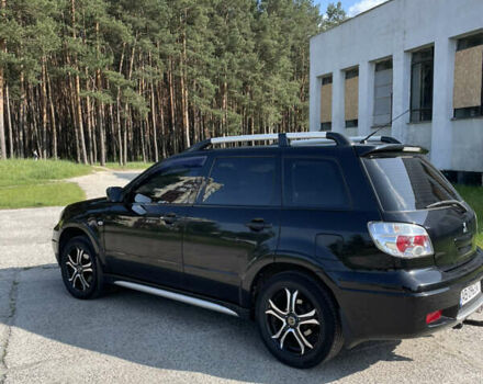 Чорний Міцубісі Аутлендер, об'ємом двигуна 2.38 л та пробігом 273 тис. км за 7100 $, фото 5 на Automoto.ua