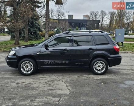 Чорний Міцубісі Аутлендер, об'ємом двигуна 2 л та пробігом 290 тис. км за 4200 $, фото 3 на Automoto.ua