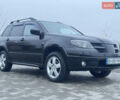 Чорний Міцубісі Аутлендер, об'ємом двигуна 2.38 л та пробігом 202 тис. км за 5800 $, фото 3 на Automoto.ua