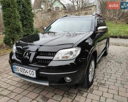 Черный Мицубиси Аутлендер, объемом двигателя 2 л и пробегом 180 тыс. км за 6000 $, фото 4 на Automoto.ua
