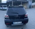 Черный Мицубиси Аутлендер, объемом двигателя 2 л и пробегом 130 тыс. км за 7100 $, фото 11 на Automoto.ua