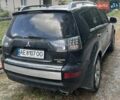 Чорний Міцубісі Аутлендер, об'ємом двигуна 2.36 л та пробігом 233 тис. км за 7500 $, фото 1 на Automoto.ua
