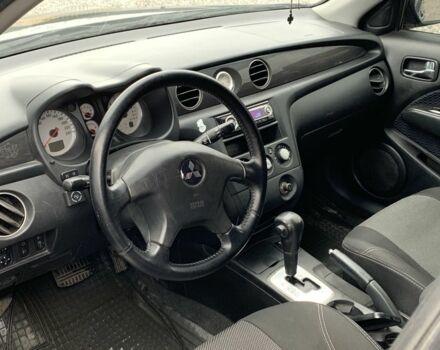 Міцубісі Аутлендер 2007 у Харкові на Automoto.ua Чорний Міцубісі Аутлендер, об'ємом двигуна 2.4 л та пробігом 240 тис. км за 5600 $, фото 10 на Automoto.ua