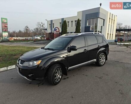 Черный Мицубиси Аутлендер, объемом двигателя 3 л и пробегом 155 тыс. км за 9800 $, фото 5 на Automoto.ua