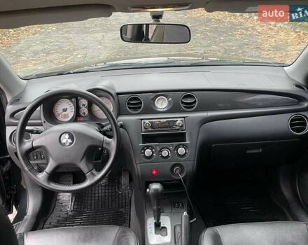 Чорний Міцубісі Аутлендер, об'ємом двигуна 2.4 л та пробігом 213 тис. км за 6850 $, фото 14 на Automoto.ua