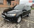 Черный Мицубиси Аутлендер, объемом двигателя 3 л и пробегом 200 тыс. км за 7999 $, фото 5 на Automoto.ua