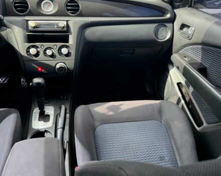 Черный Мицубиси Аутлендер, объемом двигателя 2.4 л и пробегом 258 тыс. км за 6300 $, фото 13 на Automoto.ua