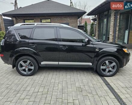 Черный Мицубиси Аутлендер, объемом двигателя 3 л и пробегом 238 тыс. км за 10800 $, фото 5 на Automoto.ua