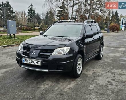 Чорний Міцубісі Аутлендер, об'ємом двигуна 2 л та пробігом 290 тис. км за 4200 $, фото 2 на Automoto.ua