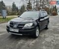 Чорний Міцубісі Аутлендер, об'ємом двигуна 2 л та пробігом 290 тис. км за 4200 $, фото 2 на Automoto.ua