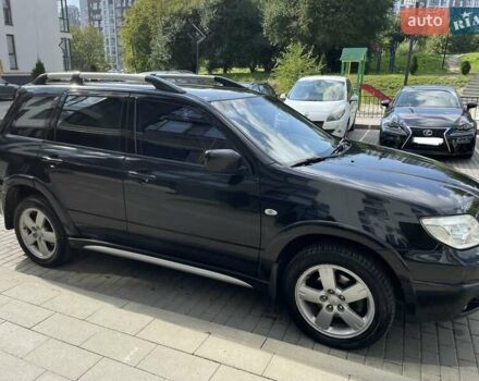 Черный Мицубиси Аутлендер, объемом двигателя 2.38 л и пробегом 310 тыс. км за 7500 $, фото 19 на Automoto.ua