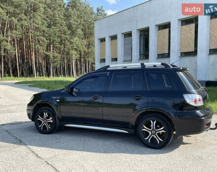 Чорний Міцубісі Аутлендер, об'ємом двигуна 2.38 л та пробігом 273 тис. км за 7100 $, фото 6 на Automoto.ua