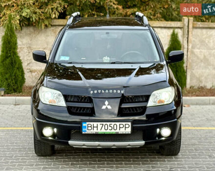 Міцубісі Аутлендер 2007 у Одесі на Automoto.ua Чорний Міцубісі Аутлендер, об'ємом двигуна 2.4 л та пробігом 201 тис. км за 7700 $, фото 39 на Automoto.ua