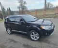 Черный Мицубиси Аутлендер, объемом двигателя 3 л и пробегом 220 тыс. км за 9000 $, фото 2 на Automoto.ua
