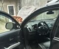 Черный Мицубиси Аутлендер, объемом двигателя 2.4 л и пробегом 240 тыс. км за 8500 $, фото 3 на Automoto.ua