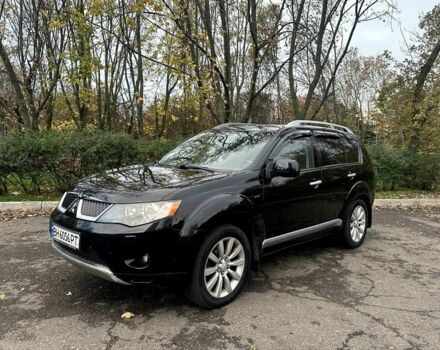 Черный Мицубиси Аутлендер, объемом двигателя 2.4 л и пробегом 230 тыс. км за 8500 $, фото 2 на Automoto.ua