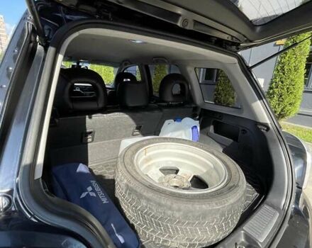 Черный Мицубиси Аутлендер, объемом двигателя 2.38 л и пробегом 310 тыс. км за 7500 $, фото 8 на Automoto.ua