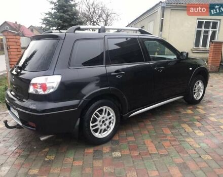 Черный Мицубиси Аутлендер, объемом двигателя 2 л и пробегом 284 тыс. км за 4500 $, фото 6 на Automoto.ua