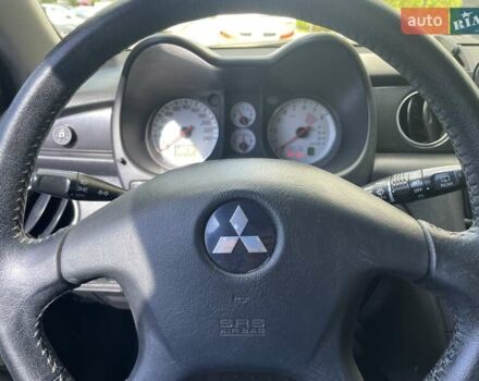 Черный Мицубиси Аутлендер, объемом двигателя 2.38 л и пробегом 310 тыс. км за 7500 $, фото 21 на Automoto.ua