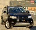 Черный Мицубиси Аутлендер, объемом двигателя 3 л и пробегом 198 тыс. км за 9500 $, фото 1 на Automoto.ua